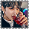Jay from Enhypen drinking out of a wine glass square stamp