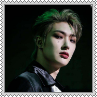 Mingi from a halloween photoshoot looking at the viewer square stamp