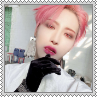 Seonghwa with pink hair gazing into the camera and holding a black gloved hand by his mouth square stamp